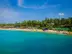 blue body of water under sunny sky